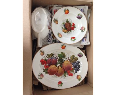A bone china dinner & tea service in a fruit pattern.