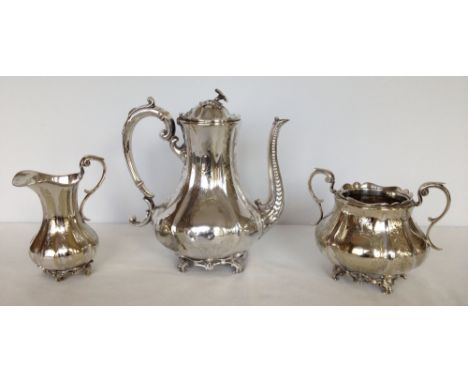 A silver plated vintage tea service comprising of tea pot, milk jug & sugar bowl.