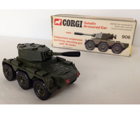 A boxed Corgi Saladin Armoured Car #906, model excellent with repro shells, box excellent.