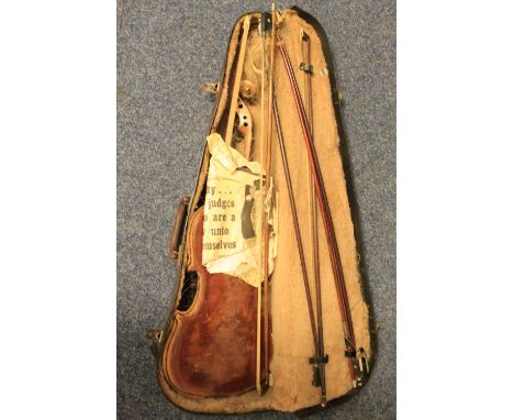 Violin case containing assorted bows, violin parts, tools etc.