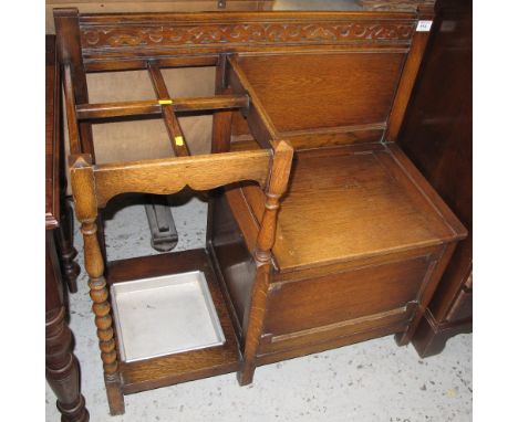 Early 20th Century hall chair with fitted stick and umbrella stand on barley twist supports.