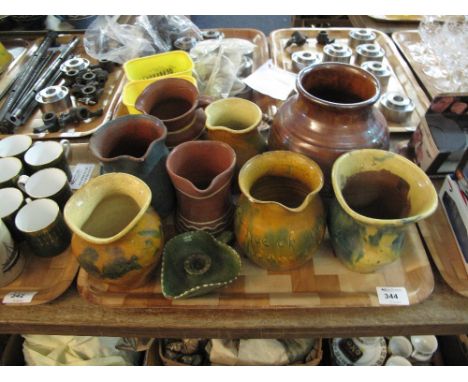 Tray of assorted Ewenny pottery items to include heart shaped chamber stick, baluster vases, jugs etc., one inscribed Prince 