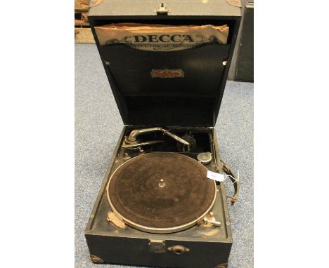 Celestial cased record player with some records.