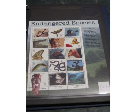 USA U/M mint stock lot of sets and sheetlets in blue Hagner album.  Many 100's of stamps 1990's to 2002 with some duplication