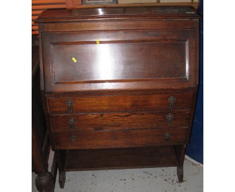 Mid 20th Century oak fall front bureau with under shelf.