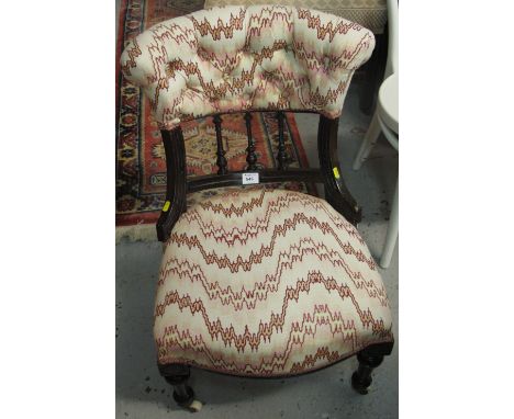 Early 20th Century stained and upholstered button back bedroom chair.