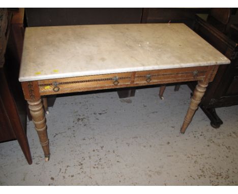 Early 20th Century pale oak and parquetry inlaid side table with marble top on ceramic casters.