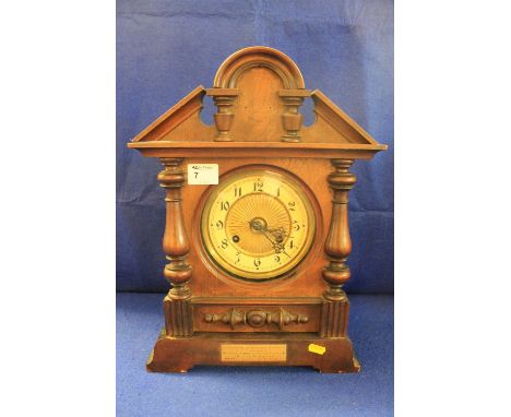 Early 20th Century presentation mahogany architectural two train enamel face mantle clock "Presented by Buglers of the first 