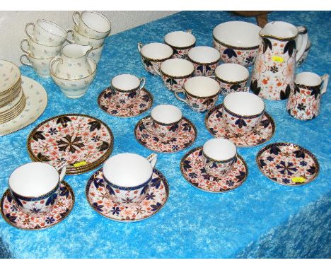 An Antique Royal Crown Derby Imari Part Tea Service