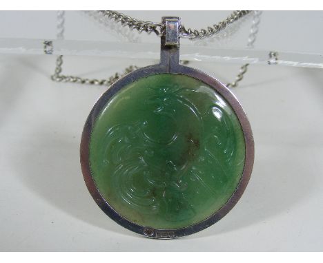 A Silver Mounted Jade Pendant