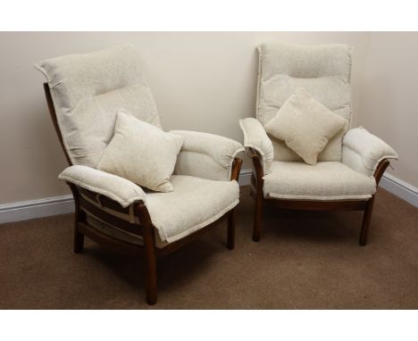 Pair Ercol Savillie armchairs in Golden Dawn elm finish, upholstered in a neutral fabric, W82cm Condition Report Click here f