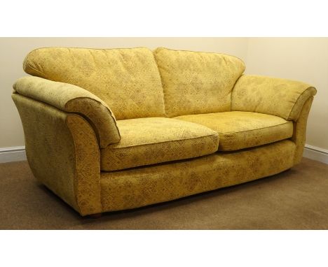 Marks and Spencer's three seat sofa upholstered in a floral patterned gold fabric, W225cm Condition Report Click here for fur