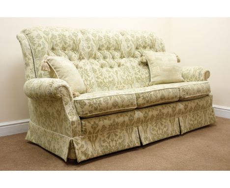 Three seat sofa, upholstered in a light green fabric with floral pattern (W180cm) a pair matching armchairs (W85cm) and foots