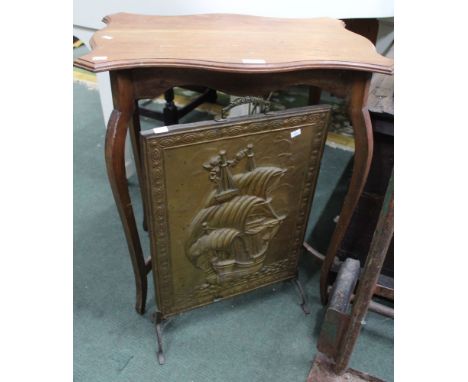 An Edwardian occasional table with under tier with a brass ship fire screen