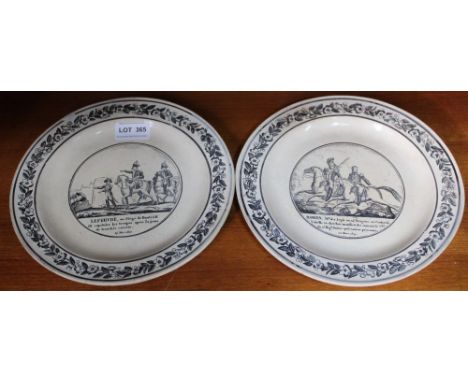 A pair of French Delftware plates, black printed scenes of Napoleon's battle at Valsette dated 25th May 1809, and the Siege o