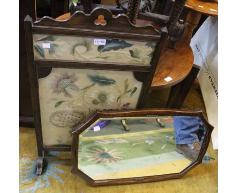 A silk embroidered oak framed fire screen with a bevel edged oak frame mirror