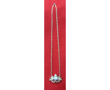 A 9ct gold necklace, the Art Nouveau design floral pendant inset an Opal, on 9ct gold chain, gross weight 7.7g
