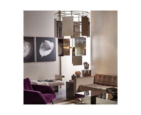 Kelly Hoppen Marilyn Chandelier Incorporates Multi-Tiered Rings Of Oversized, Cascading Metallic Sheets Of Stainless Steel Wh