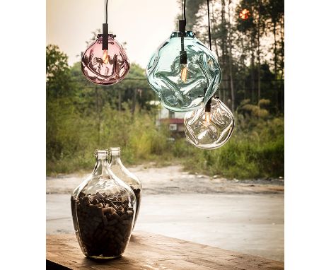 Lava Pendant (UK) Clear And Flat Brass “Like Wild Swirls Of Molten Rock” The Serene Lava Pendant Is Hand Blown Using An Age-O