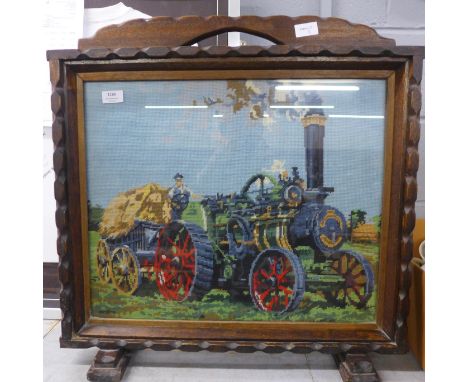 A framed tapestry firescreen **PLEASE NOTE THIS LOT IS NOT ELIGIBLE FOR POSTING AND PACKING** 