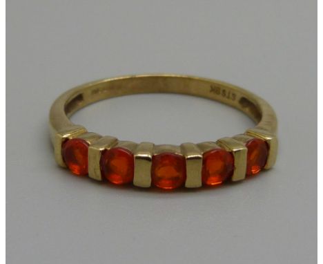 A 9ct gold and fire opal ring, 2.7g, T 