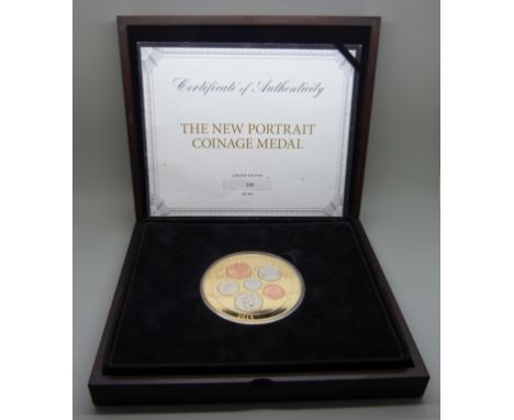 A limited edition medal, 2015 The New Portrait Coinage Medal, cased 