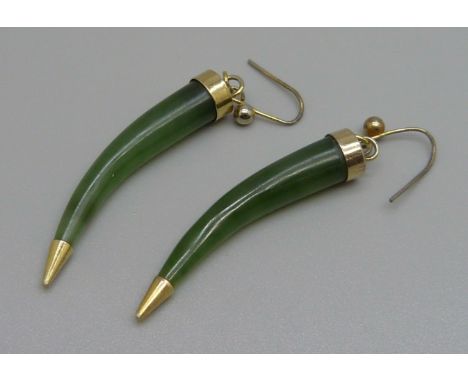 A pair of jade earrings 