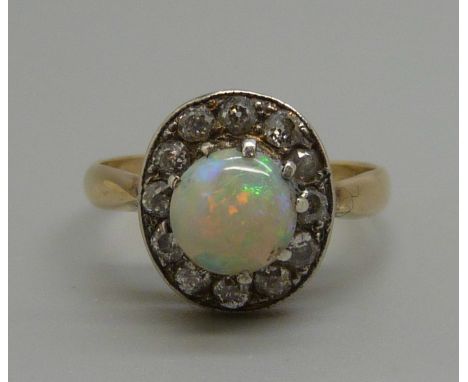 A vintage 18ct gold, opal and diamond cluster ring, 3g, M 