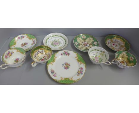 Two green 19th Century cups and saucers and two later 