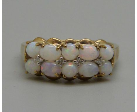 A 9ct gold and opal ring, 2.5g, R 