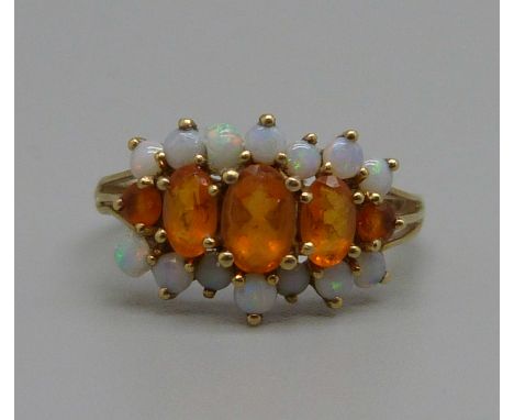 A 9ct gold, citrine and opal ring, 1.8g, O 