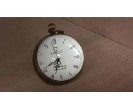 An Omega clock, compass etc.