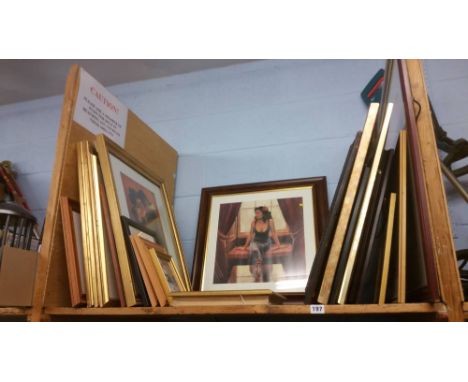 Shelf of assorted pictures
