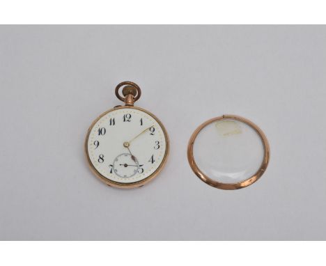 An early 20th century 9ct. Gold pocket watch,  enamel dial wih Arabic numerals and a smaller dial, base metal dust cover, mar