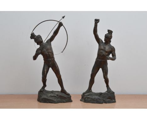 A pair of 20th century spelter figures, Greek men in classic posses, one with a bow and arrow, the other missing a spear, bot