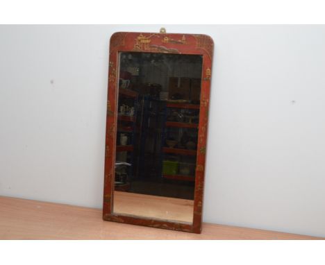A late 19th century  hand painted mirror, the frame painted red with Chinoiserie design in heightened gilt, rectangular shape