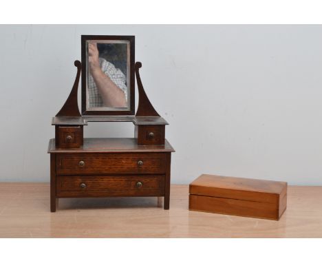 An early 20th century miniature mahogany and string inlay dressing table, with swing mirror, and two large draws, 31cm H x 22