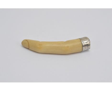 A George III bone novelty pipe tamper, in the form a finger, white metal topped with an engraved date 'November the 29. 1783'