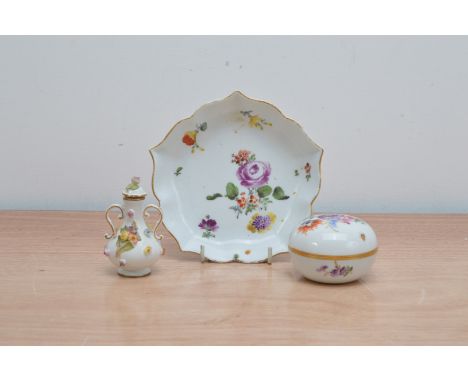 Three items of late 19th/ early 20th century Meissen porcelain, comprising a twin handled scent bottle and cover gilt and hei