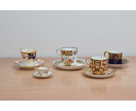 Five late 19th and early 20th century English cabinet cups and saucers, comprising a Davenport Longport example, numbered 407