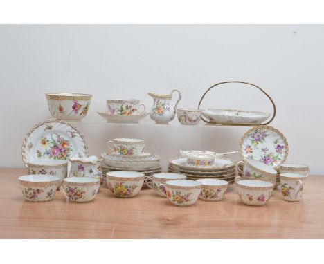 A large collection of early 20th century Dresden porcelain tea and coffee wares, including cups and saucers of differing size