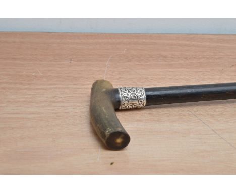 A Victorian gentleman's wooden walking stick, horn handle, with a silver collar, the collar with a monogrammed escutcheon, AF