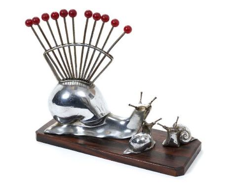 Unusual 1930s Art Deco style cocktail stick holder, in the form of a large chromed metal snail, holding twelve cocktail forks