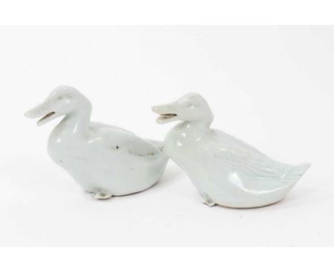 Pair of Chinese celadon glazed models of ducks, each approximately 8cm highCondition report: One has a tiny chip to the tail 