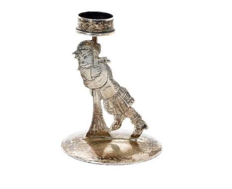 Unusual Edwardian silver novelty taper stick in the form of a drunken Scotsman, clutching a lamp post, on a circular base, Rd