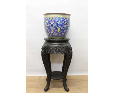 Qing style Chinese ceramic bowl of bellied form, decorated with butterflies in foliate borders, 32cm diameter, raised on ebon