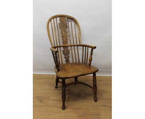 19th century ash and elm Windsor chair, with pierced splat and saddle seat on turned legs