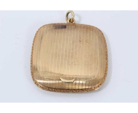 1920s gold pendant locket/pill box of square cushion shape with engine turned decoration, test as approximately 14ct gold.Con