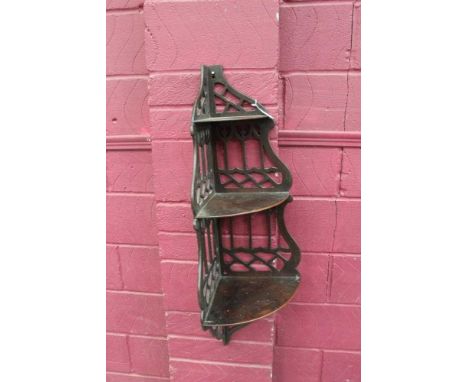 A 19th century Chinese Chippendale style mahogany pierced corner wall shelf, with three graduated shelves, 108cm