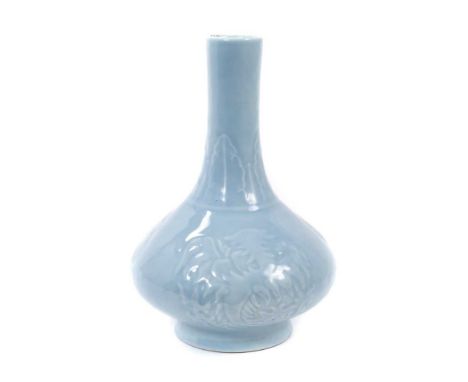 Chinese claire de lune glazed bottle vase, 19th/20th century, decorated in relief with phoenix roundels and a foliate pattern